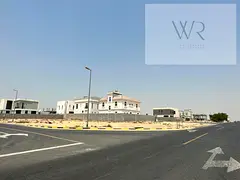 Golden Opportunity in Sharjah! Corner Residential Land on Two Streets – Prime Location with Full S