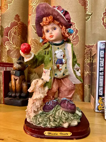 Charming Vintage Figurine with Dog and Apple