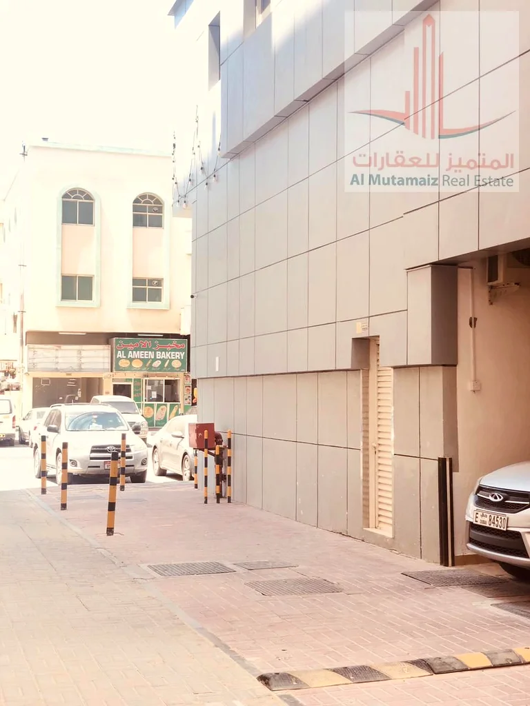 متجر للإيجار بمساحة جيدة في موقع مميز - النعيمية مناسب لجميع الأغراض التجارية قريب من مخارج الشارقة ودبي مثالي لمختلف64073229174402112
