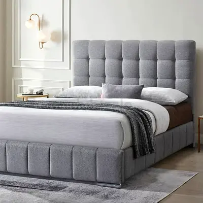 Stylish Gray Upholstered Bed with Modern Design