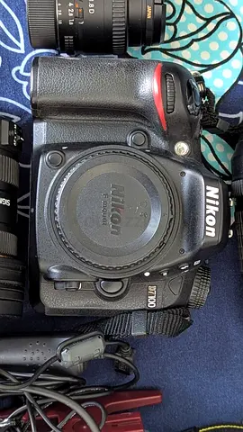 Nikon D7100 with 3 lenses, tripod and multiple accessories