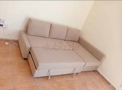 Ikea L Shape Sofa cum bed with big storage in L