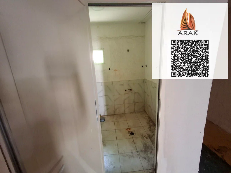 Warehouse for annual rent in Al Jurf Industrial 2 – Ajman, with a total area of 2,900 sq. ft., located directly on a main road with excellent accessib64074007962753111