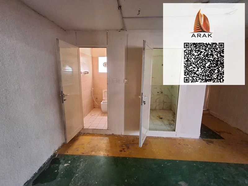 Warehouse for annual rent in Al Jurf Industrial 2 – Ajman, with a total area of 2,900 sq. ft., located directly on a main road with excellent accessib64074007962753113