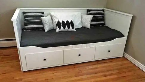 IKEA hamness Day bed with 3 storage drawers underneath and with 2 IKEA mattresses