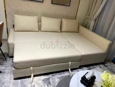 IKEA L shape sofa bed with storage in beige color