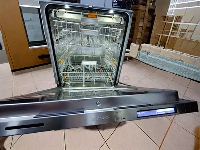Miele twice knock to open built-in fully integrated dishwasher