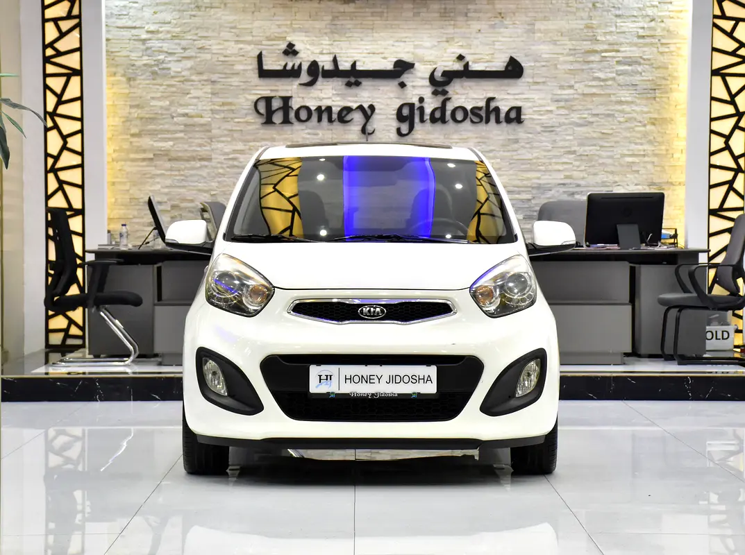 Kia Picanto 2015 — photo 1 of 16