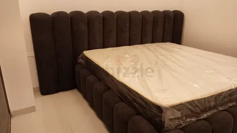 Stylish and Modern Grey Upholstered Bed with Headboard