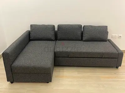 Ikea l shape sofa come bed with storage