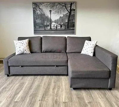 Ikea L Shape Sofa cum bed with big storage in L