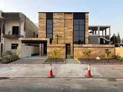 For sale luxury villa in Al Alia - Ajman | Two floors | Modern design | 5 master bedrooms | Majlis +