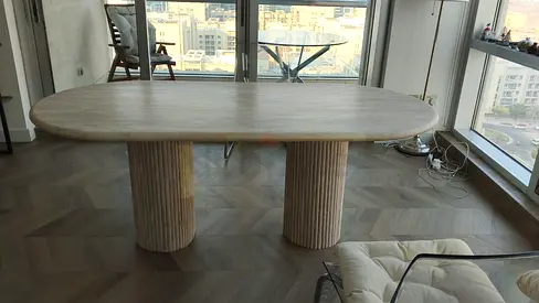 Elegant Round Dining Table with Unique Base