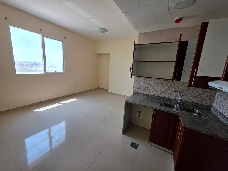 Studio for annual rent  In Al Jurf 3, Ajman  New studio, new building, prime location64221322780419114