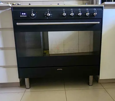 SMEG black dual fuel cooking range top gas oven electric dual fan made in Italy 90cm
