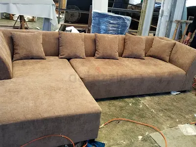 Stylish Brown L-Shaped Sofa with Cushions