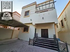 Villa for sale in Ajman, Al Muwaihat 3 area, consisting of two floors, a majlis, a hall, a kitchen,