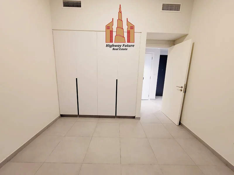 Spacious 1Bhk with Balcony and saprate Laundry Room In Aljada64051791335553113