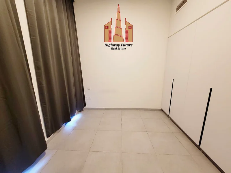 Spacious 1Bhk with Balcony and saprate Laundry Room In Aljada64051791335553111