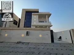 For sale, a villa in Al Zahya, Ajman, 4 master bedrooms, a living room, two halls, a kitchen with a