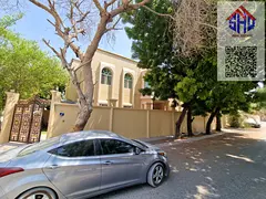 For rent a villa with 2 living 5  rooms and a maid's room