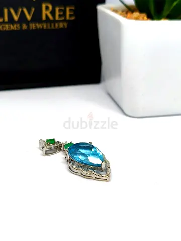 Stunning Blue Topaz and Emerald Pendant in Silver