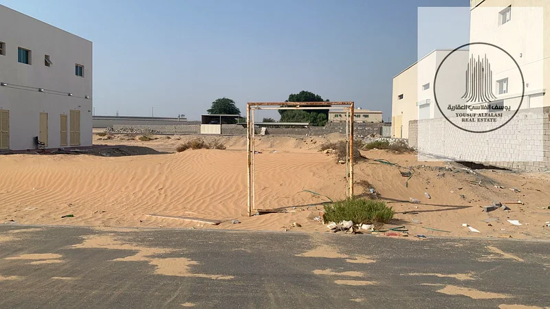 Land for rent in Ajman, Al Jurf Industrial 3, on a main street, area 6400 feet, price 89600 dirhams, suitable for warehouses and long-term contract64074673685121111