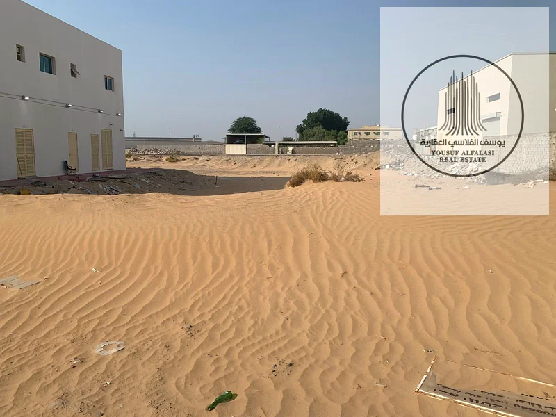 Land for rent in Ajman, Al Jurf Industrial 3, on a main street, area 6400 feet, price 89600 dirhams, suitable for warehouses and long-term contract64074673685121112