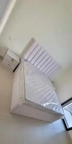 Elegant White Bed with Nightstand for Sale