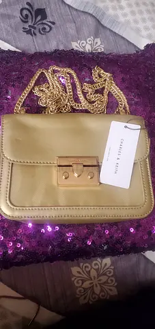 Stylish Charles  Keith Gold Crossbody Bag for Sale!