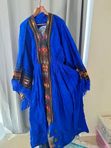 Authentic Handcrafted Ethiopian Blue Kaftan with Vibrant Embellishments