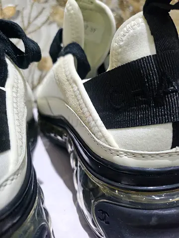 Chanel Black  White Sneakers.