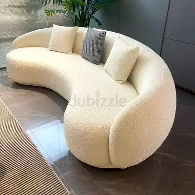 Stylish Curved White Sofa for Modern Living Spaces