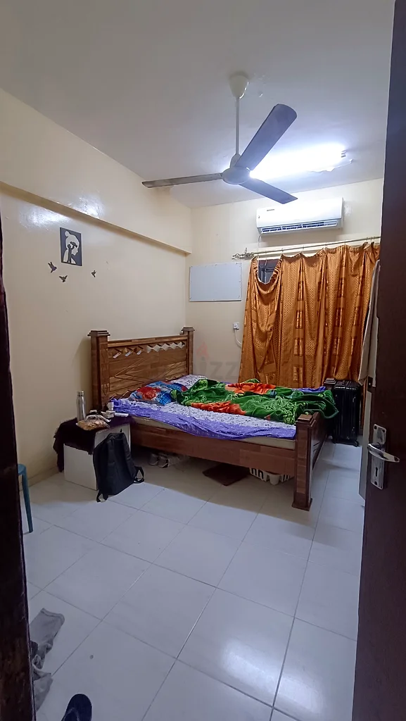 Sharing room available (FLAT) in Ajman for Kerala / Tamil family near Freezone R/A64054494614017111