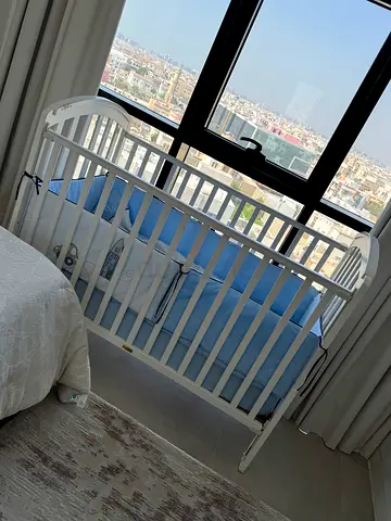 Elegant White Crib for Your Little One