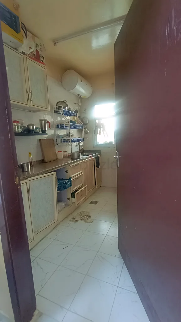 Sharing room available (FLAT) in Ajman for Kerala / Tamil family near Freezone R/A64054494614017114