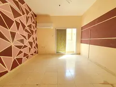 AMAZING 1BHK WITH BALCONY ON ROAD BUILDING IN MUWAILEH