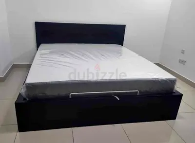 Ikea king size hydraulic bed with Ikea mattress