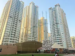 Two bedrooms and a hall for sale in Ajman Towers One. Down payment: 270,000, and the rest will be pa