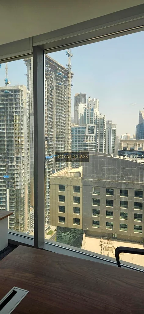 Great Location | Fully Furnished | Road, canal and Burj Khalifa View64070295441794112