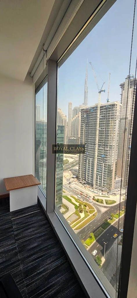 Great Location | Fully Furnished | Road, canal and Burj Khalifa View64070295441794114