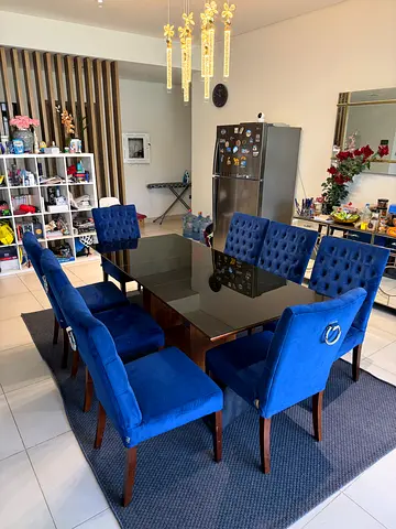 Stylish Italian glass dining table with Blue Velvet Dining Chairs for Sale