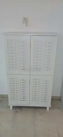 Elegant White Louvered Cabinet for Stylish Storage