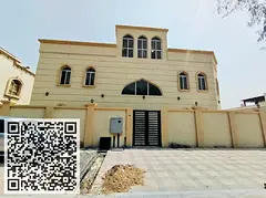Large villa for sale, divided into 4 wings, 12 rooms, in Al-Muwaihat, near the hill