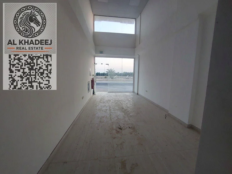 First occupant shop for rent | Prime location on the main street in Al Bahia | Suitable for all commercial activities64072889872771112