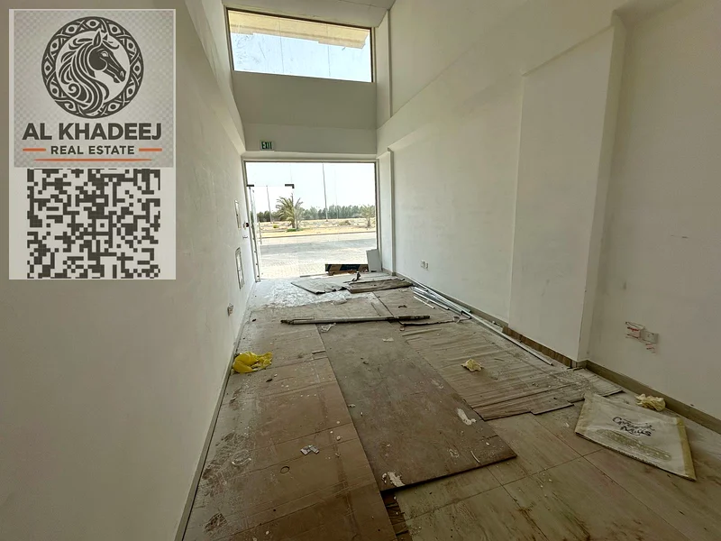 First occupant shop for rent | Prime location on the main street in Al Bahia | Suitable for all commercial activities64072889872771110