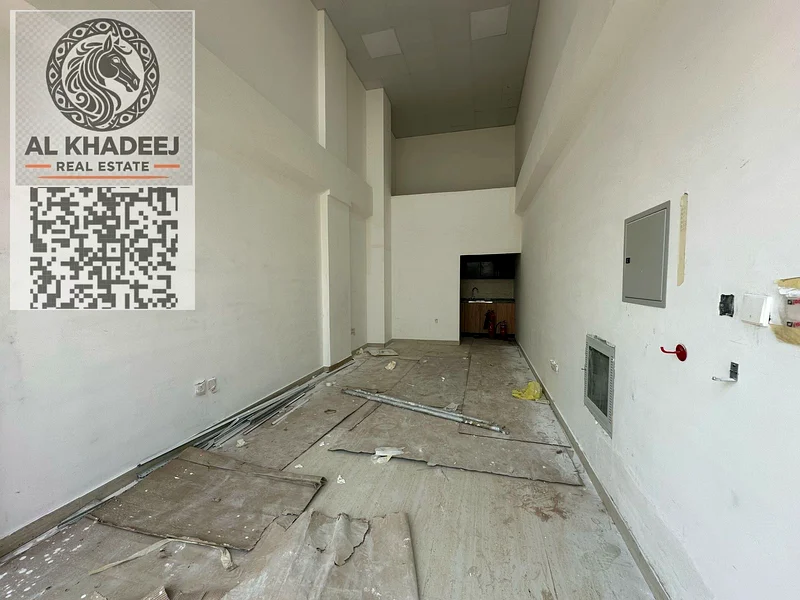 First occupant shop for rent | Prime location on the main street in Al Bahia | Suitable for all commercial activities64072889872771111