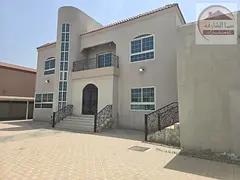 For sale, a two-story villa in Al-Jazzat area, Al-Raqqa suburb, Sharjah, a very convenient location
