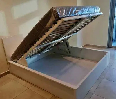 Ikea king size hydraulic bed with Ikea mattress  ‎