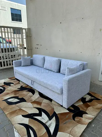 IKEA Friheten three seater sofa bed under storage